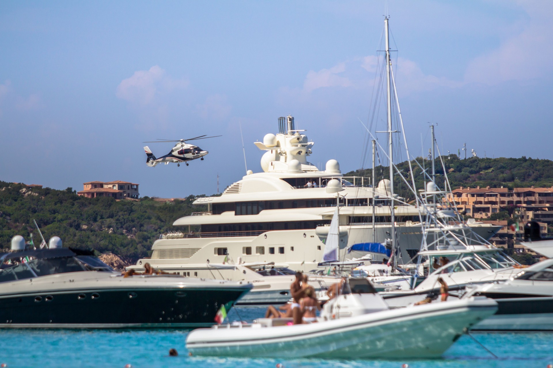 Luxury yachts at Porto Massimo bay at Sardinia Island, Italy